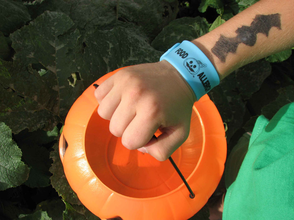 Teal Pumpkin Glow-in-the-Dark Food Allergy Slap Bracelet by Allergy Superheroes.